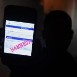 A Sri Lankan man mobile phone user shows an image on Twitter showing that the Facebook site had been blocked in Colombo on March 7, 2018. - Telecommunication service providers said they have blocked access to facebook and several other social media platforms on the directive of the government which accused extremists of using the popular social media to spread hate speech and instigate violence against the Muslim minority in the country. (Photo by ISHARA S. KODIKARA / AFP)        (Photo credit should read ISHARA S. KODIKARA/AFP/Getty Images)