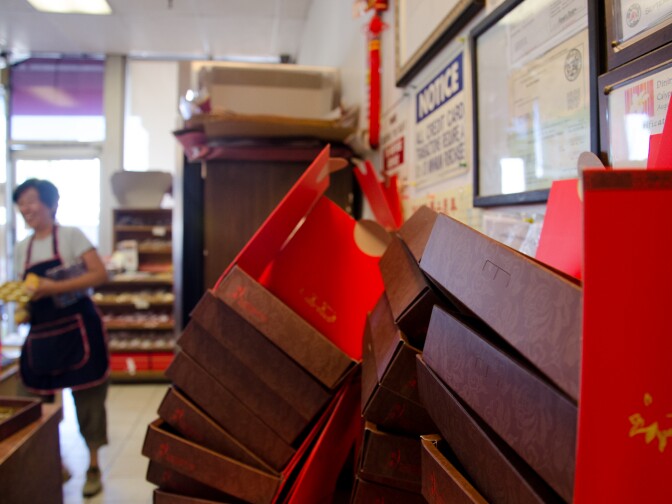 Cindy Sun helps prepare an order of more than 50 boxes of Mooncake in Temple City, Calif., Monday September 24, 2012. The small pastries are made for the Chinese Moon Festival which takes place during the eight lunar month each year.