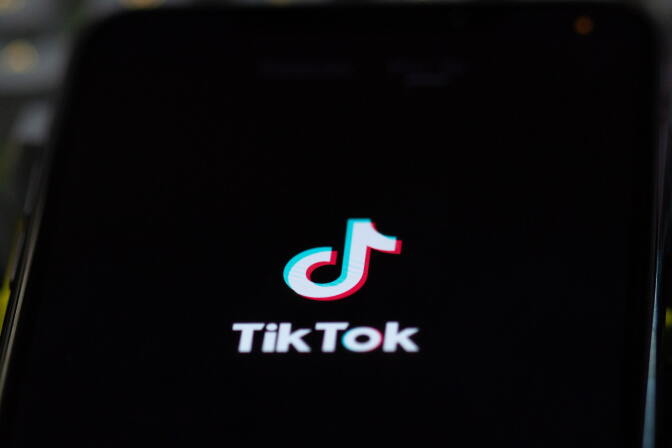 A close-up of the TikTok logo on a phone screen. 