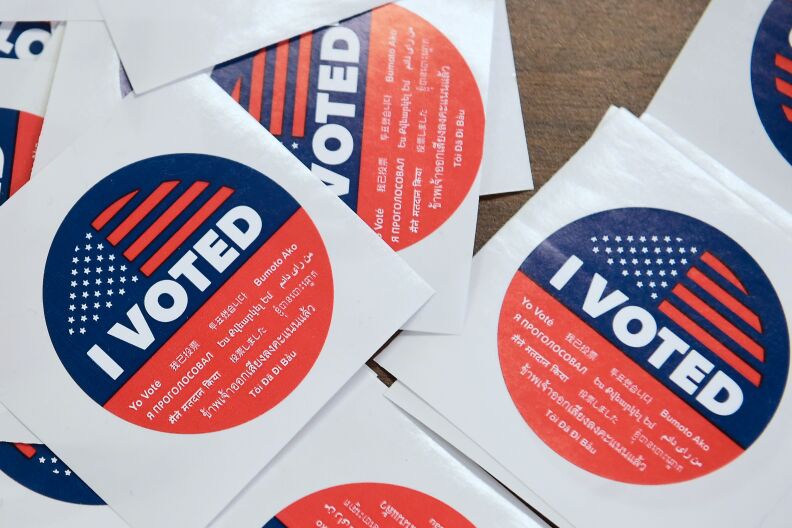 California's multi-language "I Voted" stickers on offer for early voters at the Los Angeles County Registrar's Office in Norwalk, California on November 5, 2018, a day ahead the November 6 midterm elections in the United States. (Photo by Frederic J. BROWN / AFP) (Photo credit should read FREDERIC J. BROWN/AFP/Getty Images)