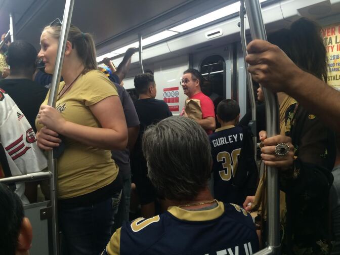 August 20, 2016: All aboard the Metro as Rams fans leave the L.A. Coliseum after a game between the Rams and the Kansas City Chiefs.