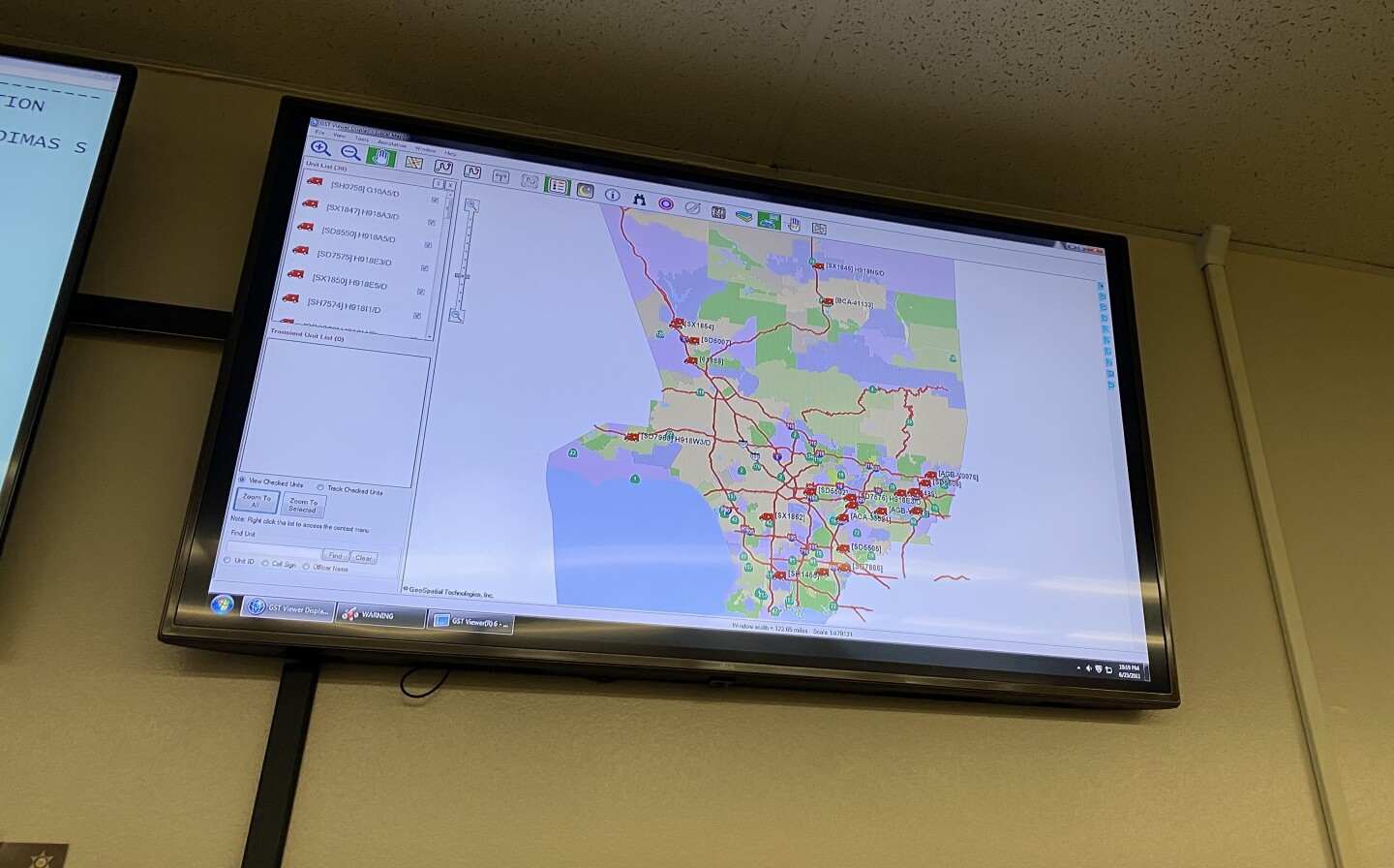 A screen at MET dispatch center in South El Monte displays the location of units across the county.