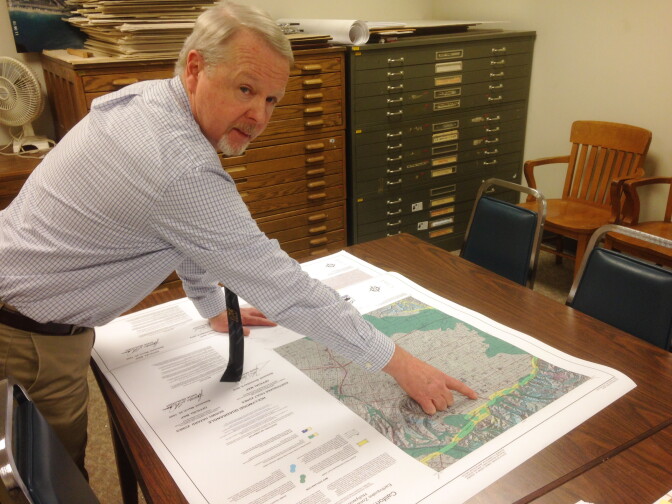 California Geological Survey's Tim McCrink pointing to the location of the Hollywood fault on the newly released map.