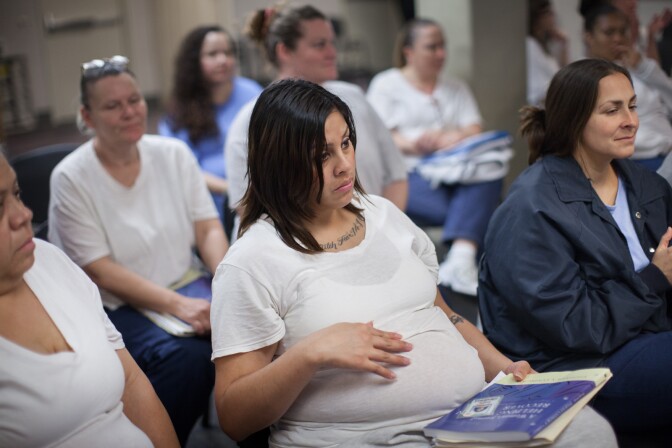 Regina Zodiacal attends a rehabilitation class at the women's prison in Chino, Calif. Seven months into her pregnancy, Zodiacal feared being "trapped" in her cell "going through labor."
