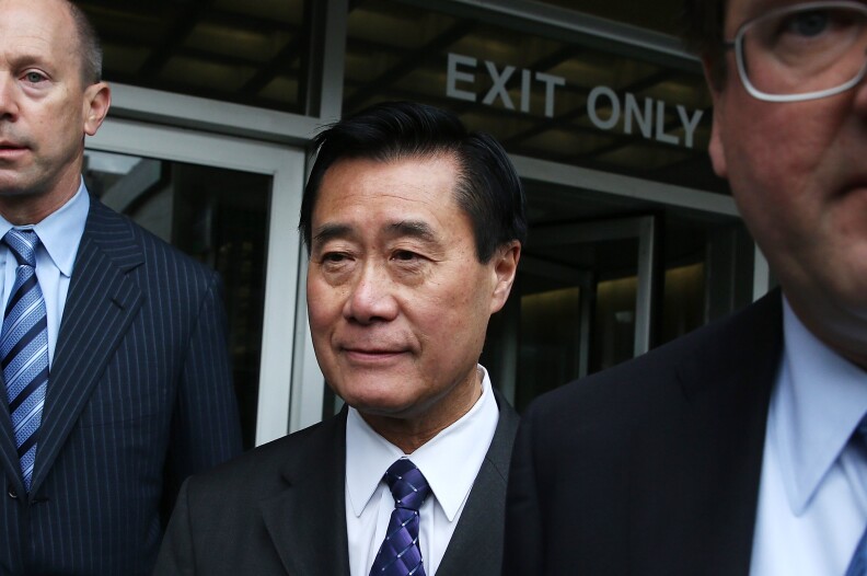 SAN FRANCISCO, CA - MARCH 31:  California State Sen. Leland Yee (C) leaves the Phillip Burton Federal Building after a court appearance on March 31, 2014 in San Francisco, California. Yee appeared in federal court today for a second time after being arrested along with 25 others by F.B.I. agents last week on political corruption and firearms trafficking charges. Yee is free on a $500,000 unsecured bond.  (Photo by Justin Sullivan/Getty Images)
