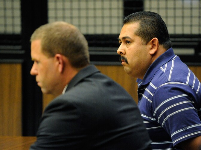 A trial date was set Friday for October 18, 2013 for two former Fullerton police officers in connection with the beating death of Kelly Thomas. (Photo: Handcuffed ex-Fullerton police officer Manuel Ramos (R) was charged with second-degree murder and involuntary manslaughter and Cpl. Jay Cicinelli (L) charged with involuntary manslaughter and use of excessive force for the death of Kelly Thomas, a schizophrenic homeless man who died after altercation with several police officers, during arraignment in Orange County Superior Court on Sept. 21, 2011 in Santa Ana.)