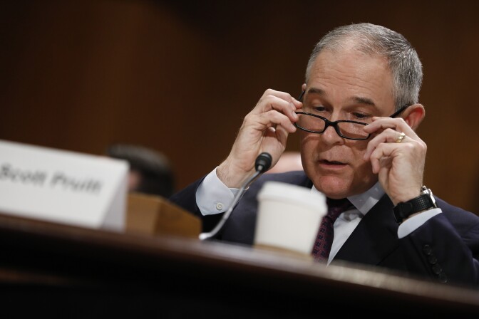WASHINGTON, DC - JANUARY 18: Oklahoma Attorney General Scott Pruitt, President-elect Donald Trump's choice to head the Environmental Protection Agency, testifies during his confirmation hearing before the Senate Committee on Environment and Public Works on Capitol Hill January 18, 2017 in Washington, DC. Pruitt is expected to face tough questioning about his stance on climate change and ties to the oil and gas industry.   (Photo by Aaron P. Bernstein/Getty Images)