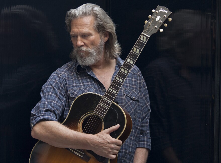 In this Aug. 4, 2011 photo, actor and musician Jeff Bridges poses for a portrait in Beverly Hills, Calif. Bridges released a self-titled album on Tuesday, Aug. 16, 2011. (AP Photo/Jason Redmond)
