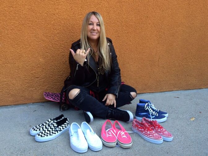 Female skateboarder Cindy Whitehead poses with some of her favorite Vans — including the pink pair she wore when she skated down the 405 Freeway during Carmageddon II.