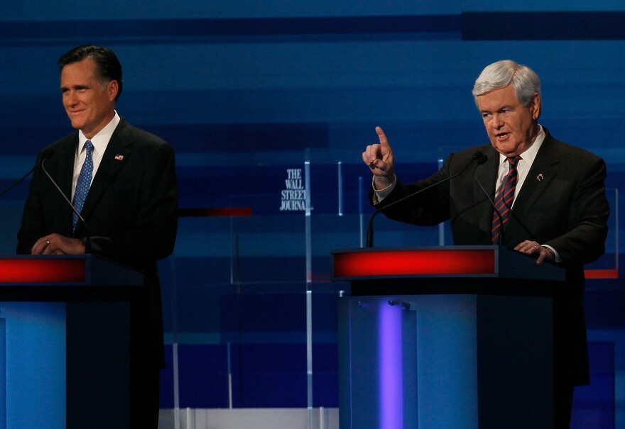MYRTLE BEACH, SC - JANUARY 16:  Republican presidential candidates, former U.S. House Speaker Newt Gingrich (R-GA) (R), and former Massachusetts Gov. Mitt Romney (L) participate in a Fox News, Wall Street Journal sponsored debate at the Myrtle Beach Convention Center, on January 16, 2012 in Myrtle Beach, South Carolina. Voters in South Carolina will head to the polls on January 21st. to vote in the Republican primary election to pick their choice for U.S. presidential candidate.  (Photo by Joe Raedle/Getty Images)