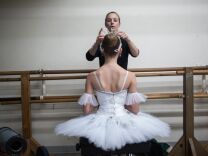 An instructor gets her student ready for a Nutcracker rehearsal at Westside Ballet in Santa Monica, Calif. This year the show went on despite the absence of the school's founder, Yvonne Mounsey.