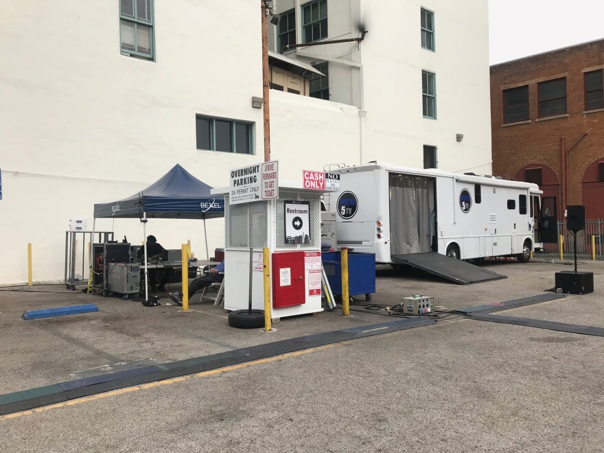The TV media van the performers would enter and come out of. A military general, the secretary of state, reporters and eyewitnesses all streamed in and out of the van during the performance. Photo credit: Adriana Cargill