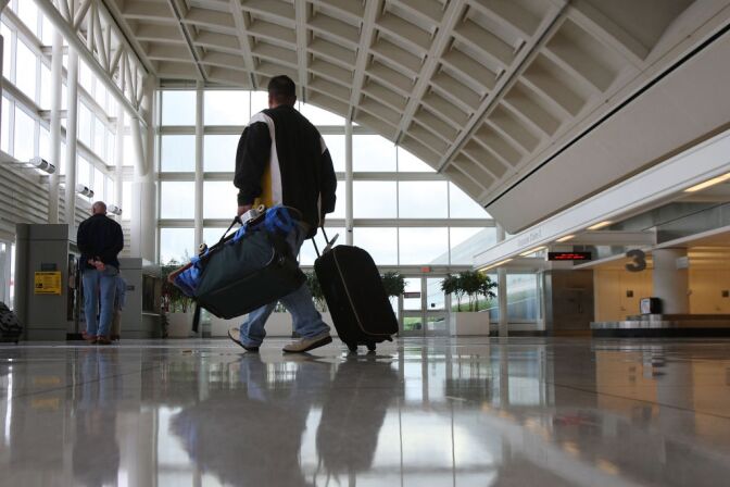 The City of Ontario has filed a legal claim to gain control over the L.A./Ontario International Airport. Some Inland Empire leaders this week criticized a plan by Los Angeles airport commissioners to increase the number of passengers at  the Ontario airport. (L.A./ Ontario International Airport. Photo by David McNew/Getty Images)