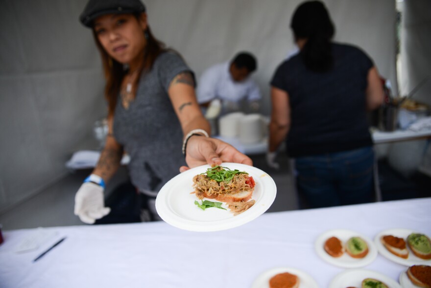 A participant in the 2017 Taste of the Nation food festival.