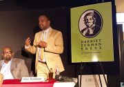 Elias Wondimu announces Harriet Tubman Press at an event at a community discussion of African-American publishing at the Vision Theater in Leimert Park on Monday, Aug. 15, 2016.
