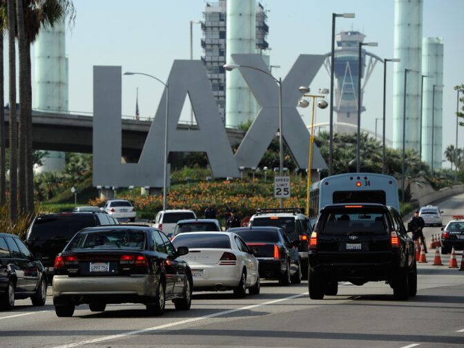 Travelers are stopped at a security check point at Los Angeles International Airport on November 23, 2011 in Los Angeles.
