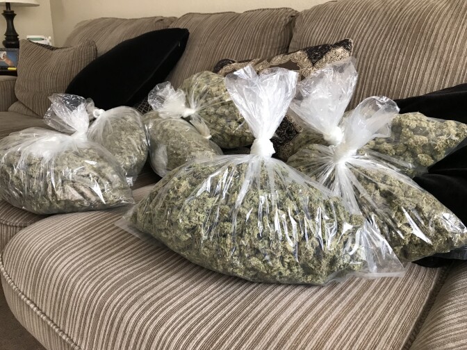 Bags of cannabis await packaging for retail sale through a medical marijuana delivery service in Orange County. Advocates for pot regulation say a black market will likely continue to flourish if California cities and counties refuse to provide local business permits. 