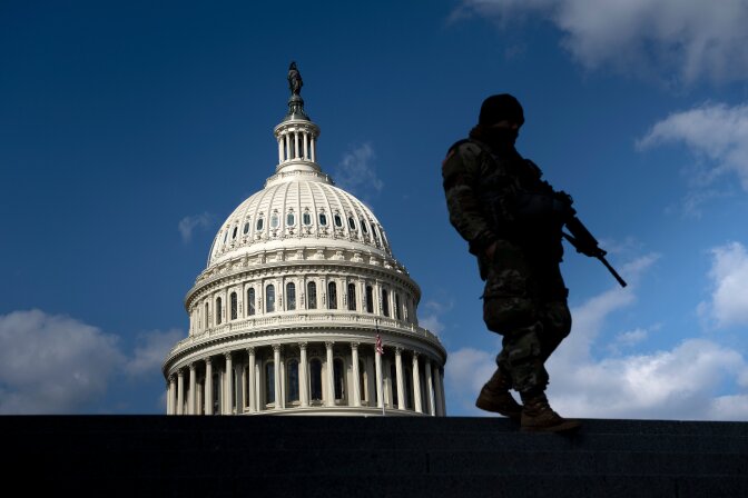 A member of the National Guard patrols the grounds of the US Capitol on March 4, 2021, in Washington, DC. - Lawmakers and staff were advised to stay away from the US Capitol after the FBI and Homeland Security Department warned that violent militia groups and QAnon followers had discussed attacking the legislature on or about March 4. The FBI-Homeland Security bulletin said extremists are still motivated by unfounded Republican claims of widespread voter fraud in the November presidential election won by Democrat Joe Biden. (Photo by Brendan Smialowski / AFP) (Photo by BRENDAN SMIALOWSKI/AFP via Getty Images)