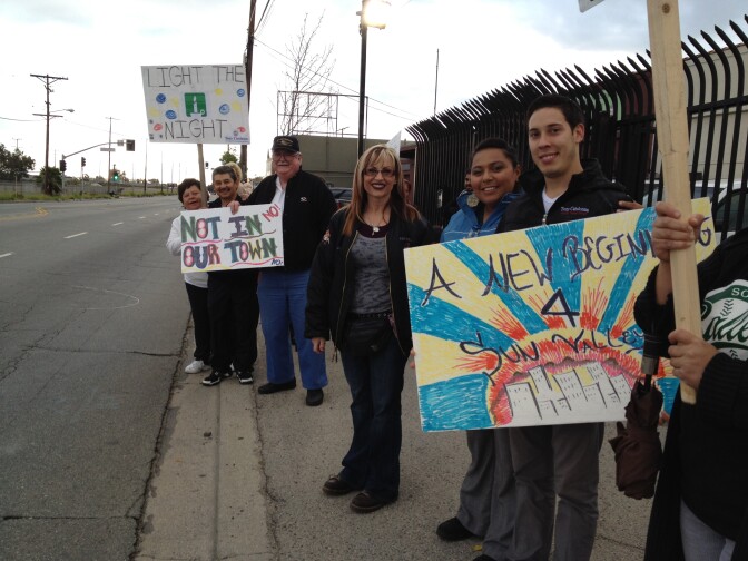 A group of Sun Valley residents and LAPD officers march along Lankershim Boulevard and San Fernando Road as a way to deter prostitutes and johns from soliciting for sex in their neighborhood.  