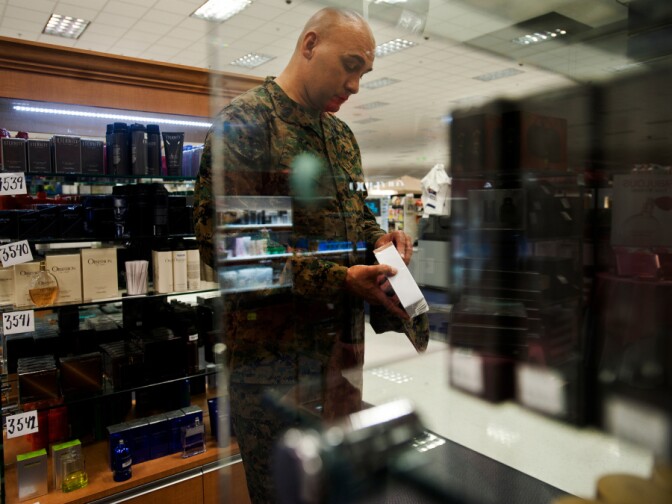 The Camp Pendleton commissary remains open on Tuesday, in order to sell off perishable goods. But base officials expect it to close by Wednesday. Master Gunnery Sgt. Dean Price looks at colognes in MCX on Jan. 24, 2013. MCX is not government subsidized, and prices are closer to those at commercial stores.