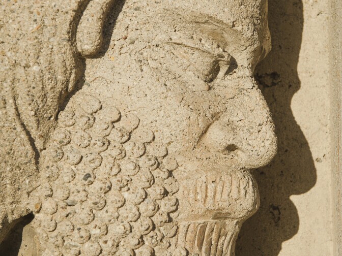 A concrete figure modeled on ancient carvings decorates the Citadel Outlets in Commerce, California.  