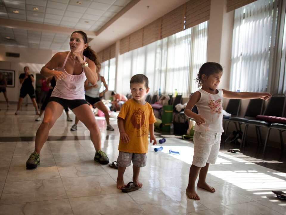 Rosina Aguiar of McLean, Va., brought her kids to the Mommy Bootie Camp workout.
