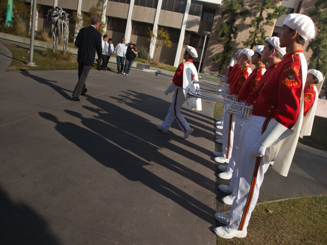 Brian Mellstrom of La Canada High School (front right) and the herald trumpets of the Tournament of Roses Honor Band prepare for their performance on Friday.
