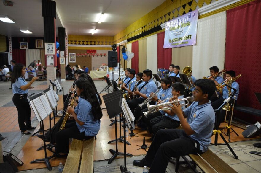 19-year-old Yulisa Maqueos directs the Maqueos Music Academy band.
