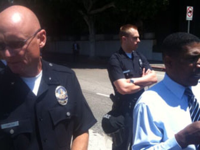 Incident Commander Andrew Smith (left) and Captain Eric Davis of the Los Angeles Police Department before ordering protesters out of the street