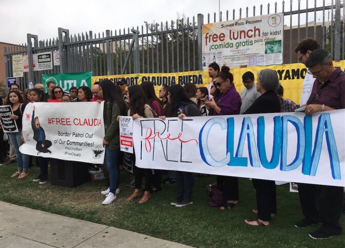Supporters of local immigrant rights activist Claudia Rueda, 22, rally Thursday in front of Roosevelt High School in Boyle Heights. Rueda is being detained in San Diego, where she is set for a bond hearing to determine if she should be released while her deportation case proceeds.