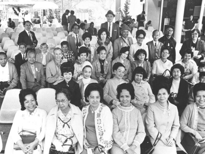 Women of the Los Angeles Philippines Women's Club and their husbands spend a day at the horse races at Hollywood Park, 1960. 