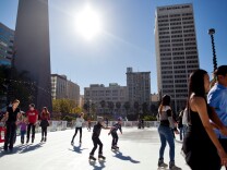 Kids skate during Downtown on Ice at Pershing Square on Christmas Eve. This is the sixteenth season of the rink in downtown.