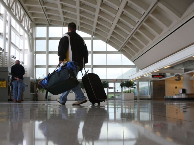 The City of Ontario has filed a legal claim to gain control over the L.A./Ontario International Airport. Some Inland Empire leaders this week criticized a plan by Los Angeles airport commissioners to increase the number of passengers at  the Ontario airport. (L.A./ Ontario International Airport. Photo by David McNew/Getty Images)