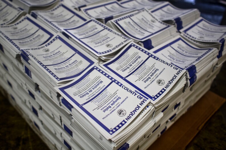 Sample Ballots for San Joaquin County are prepped for shipping. Each palate can carry thousands of ballots, which will be wrapped in cellophane.