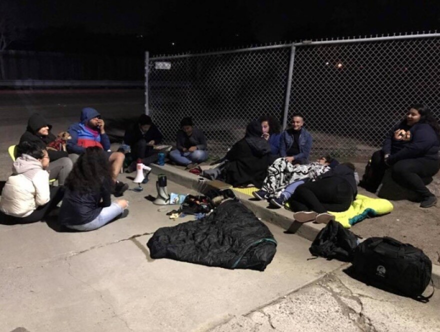 Protesters from the Immigrant Youth Coalition, an activist group, protest in San Diego on Thursday night for the release of fellow immigrant rights activist Claudia Ruedas. Ruedas was arrested and detained for deportation this week, following a drug raid at her family home late last month. Her father was arrested on criminal charges, but she and her mother were not. While neither faces charges, both women are fighting their deportation.