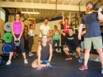The Super Friends. They were unhappy being unable to exercise in gyms because they didn’t feel safe, so created an “exercise bubble.” They’re all regularly tested and are very careful while not around each other. Their small group gives them comfort and the motivation of other CrossFit trainers. From left to right:  Sandra, Belinda (Sandra’s twin sister), Emmanuel, Gabriela (front center), Andi, Aubree, Daniel (squatting) and Terry.