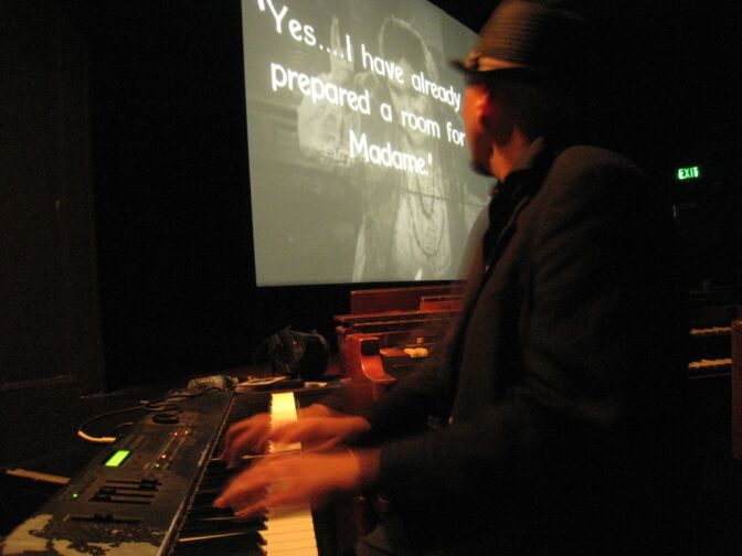 Cliff Retallick is one of the youngest musicians in the silent movie business.  The 35-year-old accompanied the film that followed Mitchell's video tribute.