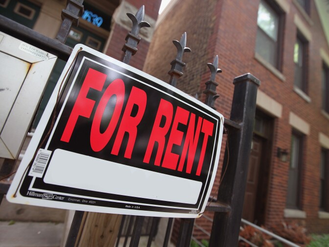 A 'For Rent' sign stands in front of a house on May 31, 2011 in Chicago, Illinois.