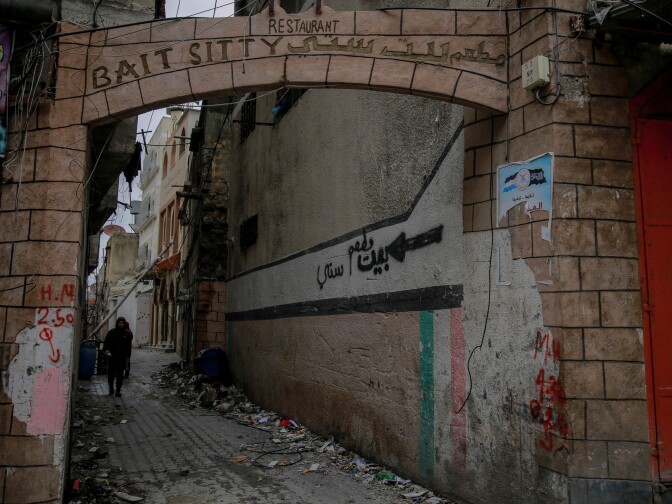 The archway leading to Beit Sitti as it looks now. The cafe appears to still be standing following Israeli strikes in the area. It was locked and inaccessible to survey if there was any damage.