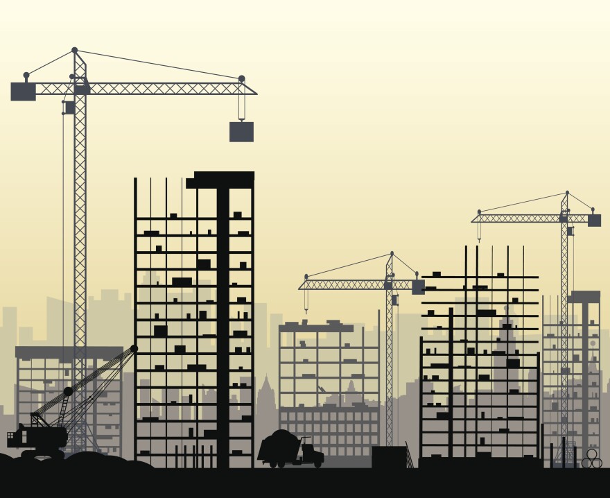 Construction site with buildings and cranes. skyscraper under construction.