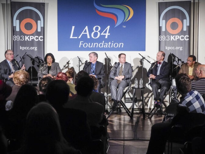 (L-R) AirTalk host Larry Mantle, Anita L. DeFrantz, Rich Llewellyn, Jeff Millman, Barry Sanders and Herb Wesson at the LA84 discussion on November 5, 2015.