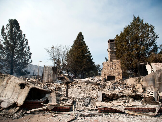 The U.S. Forest Service Thursday said 53 structures including 24 residences were destroyed by the Powerhouse wildfire near Palmdale in northern Los Angeles County. (Photo: A Lake Hughes home on Newview Road is one of several homes that have been destroyed by the Powerhouse Fire, which started on Thursday afternoon and has since burned thousands of acres.)