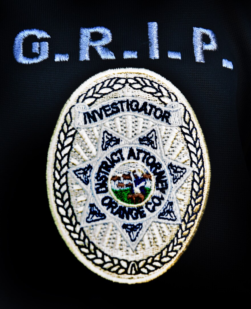 Thursday morning in Buena Park, Francisco Reynoso, an investigator with the Orange County District Attorney's office, accompanied Buena Park police officers as they arrested two parents for the high truancy rates of their children. Reynoso works with the Orange County Gang Reduction Intervention Partnership (OC GRIP).