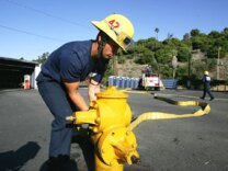 A firefighter recruit practices during training by the Los Angeles Fire Department at the Frank Hotchkin Memorial Training Center Los Angeles, California. File photo.