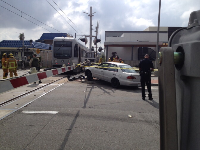 A Metro train collided with a Toyota Corolla Sunday, briefly shutting down service on the Gold Line. 