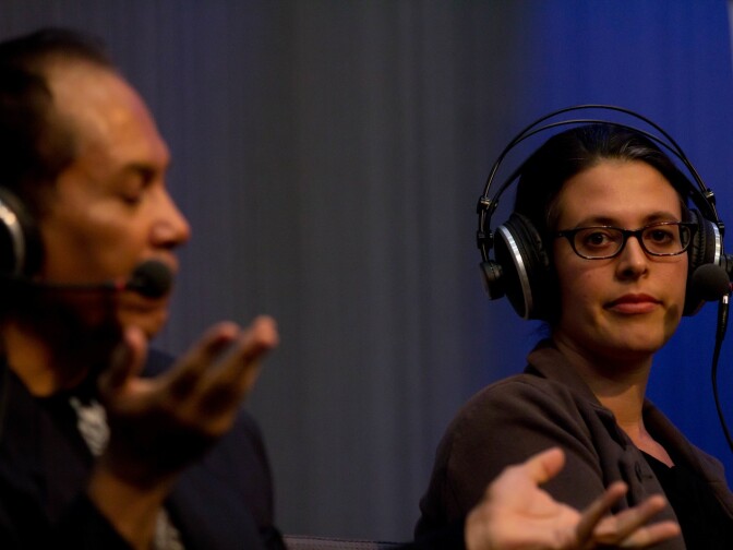 Sonia Romero, right, speaks at 