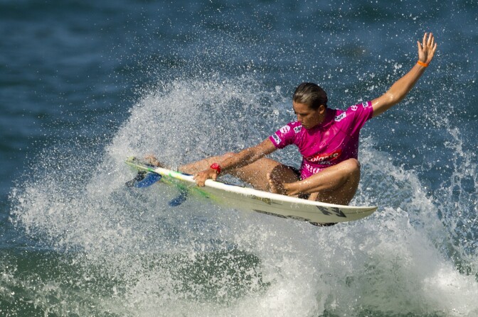 US Courtney Conlogue surfs during the first day of the ASP women world tour Billabong Rio Pro 2013 at Barra de Tijuca beach in Rio de Janeiro, Brazil on May 10 , 2013.  AFP PHOTO/CHRISTOPHE SIMON        (Photo credit should read CHRISTOPHE SIMON/AFP/Getty Images)
