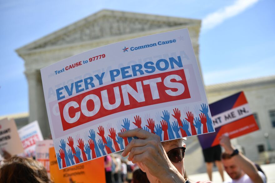 Demonstrators rally at the US Supreme Court in Washington, DC, on April 23, 2019, to protest a proposal to add a citizenship question in the 2020 Census. - In March 2018, US Secretary of Commerce Wilbur Ross announced he was going to reintroduce for the 2020 census a question on citizenship abandoned more than 60 years ago. The decision sparked an uproar among Democrats and defenders of migrants -- who have come under repeated attack from an administration that has made clamping down on illegal migration a hallmark as President Donald Trump seeks re-election in 2020. (Photo by MANDEL NGAN / AFP)        (Photo credit should read MANDEL NGAN/AFP/Getty Images)