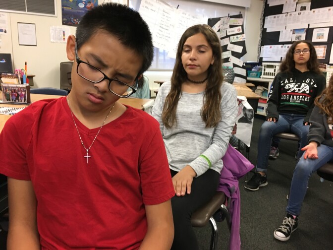 Sixth graders in Anaheim practice mindfulness to help them open up their minds. 