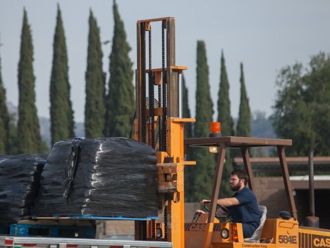 Residents of the city of Glendora prepare for the upcoming storm by picking up sandbags at the Glendora City Yard on Thursday, Dec. 11, 2014.

(Photos by Susanica Tam/ for KPCC)